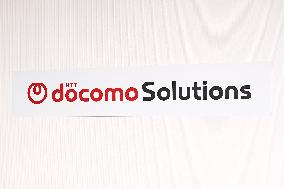 Docomo Solutions signboard and logo